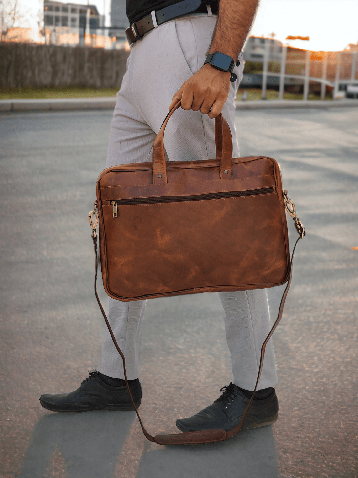 a man hanging Vintage Messenger Bags
